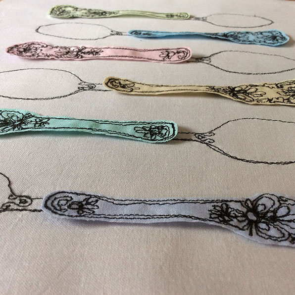 Freehand machine embroidered stitched cutlery